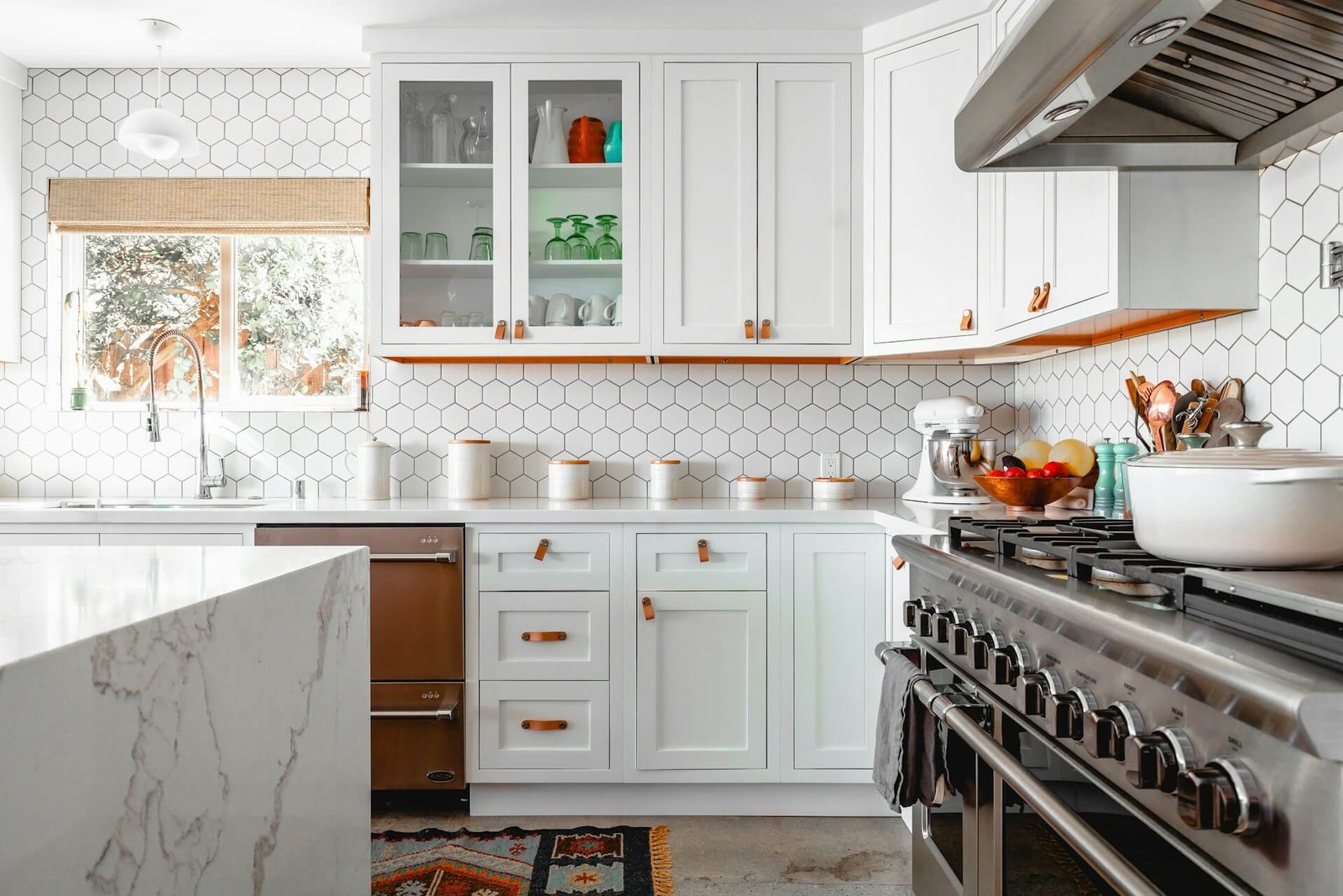 white kitchen with brass details